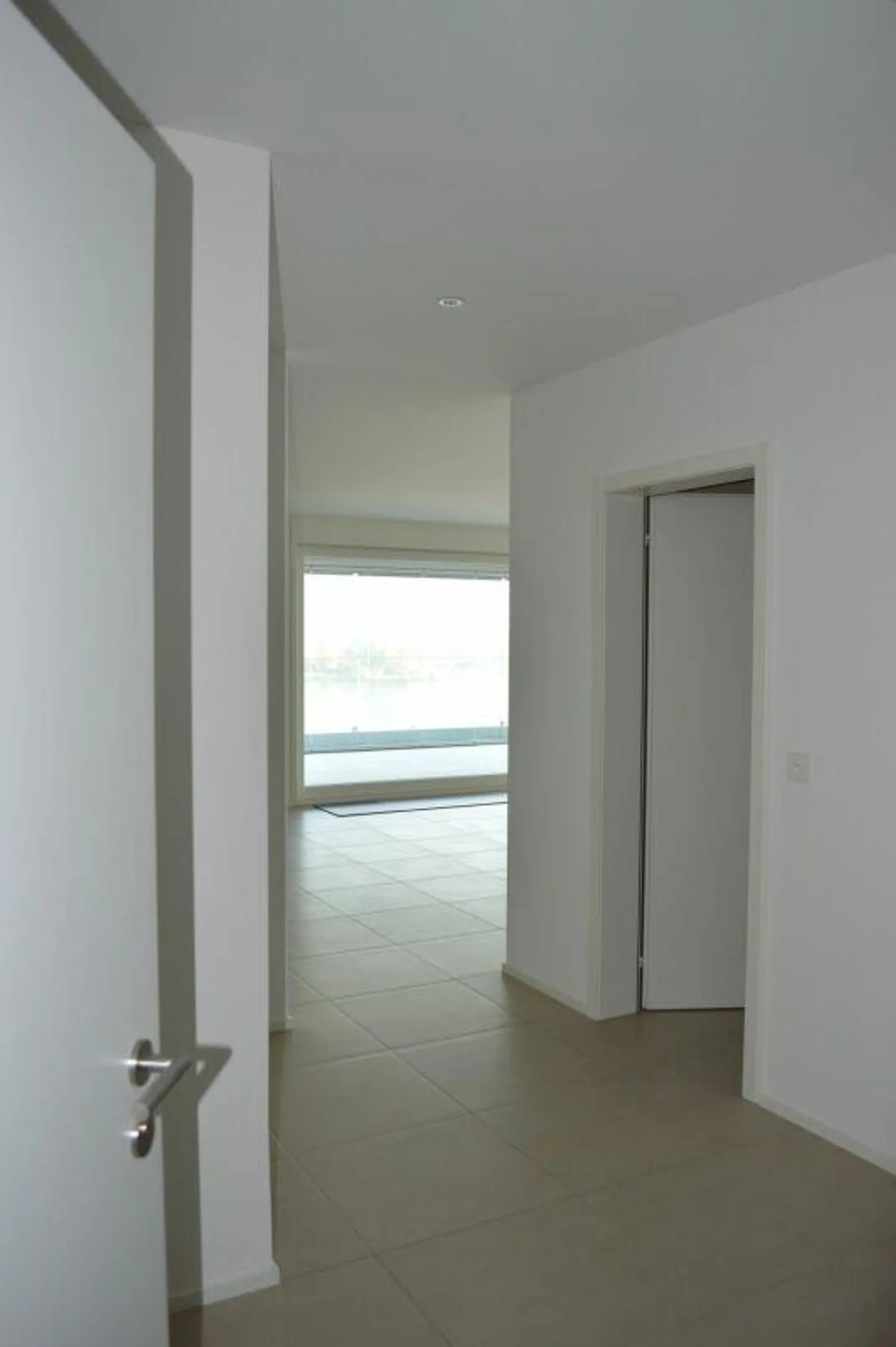 5.5-Zimmerwohnung mit tollem Ausblick auf See und Berge - Foto 11 von 12