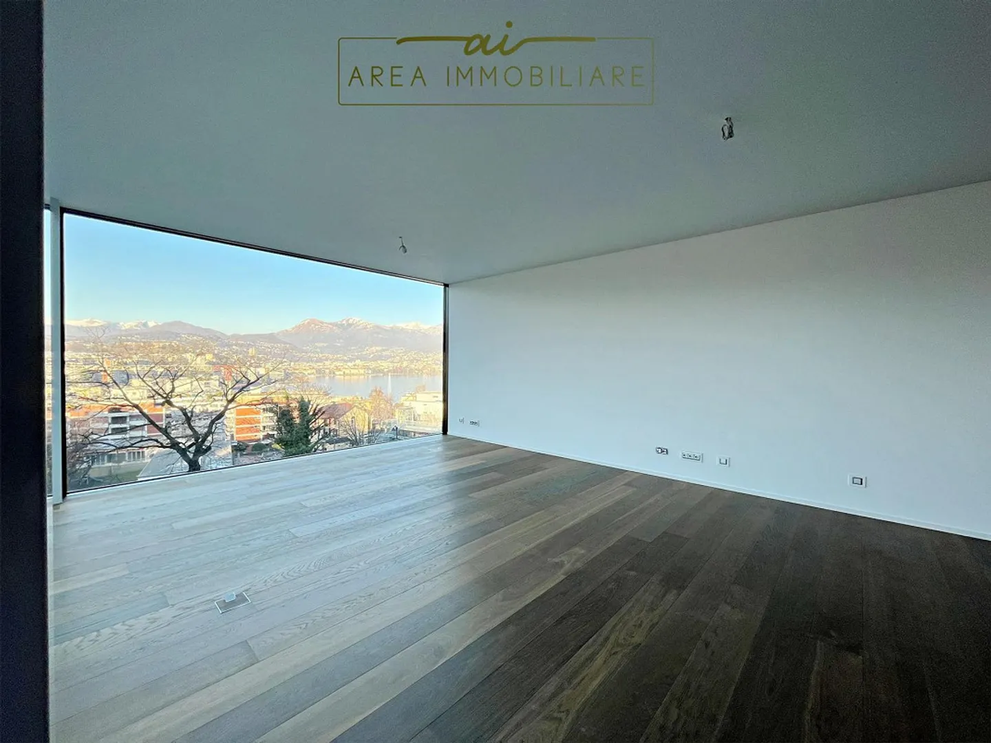 NEW 4.5-ROOM PENTHOUSE WITH LAKE VIEW IN PARADISO - Photo 1 of 13