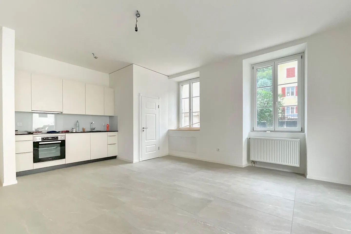 Kernsaniertes und vollvermietetes Wohn- und Geschäftshaus mit 5% Bruttorendite - Foto 3 von 10