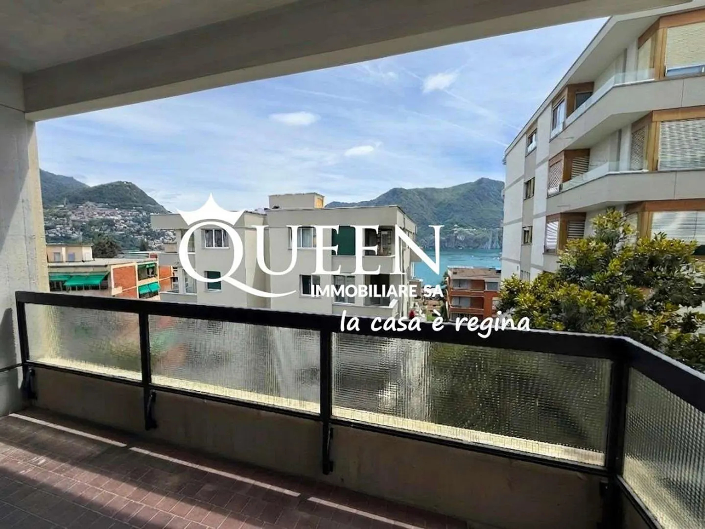 Lugano central : appartement spacieux et lumineux de 2,5 pièces avec vue partielle sur le lac - Photo 1 sur 13