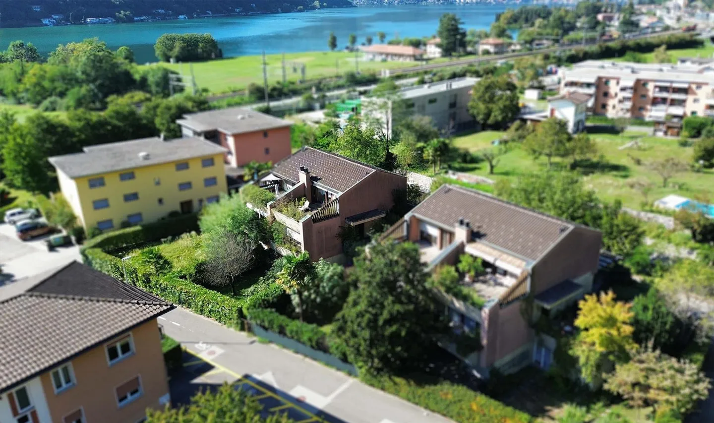 Geräumiges Doppelhaus mit Garten in Melano - Foto 13 von 19