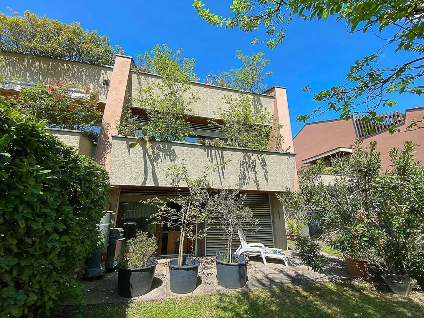 Geräumiges Doppelhaus mit Garten in Melano - Foto 17 von 19