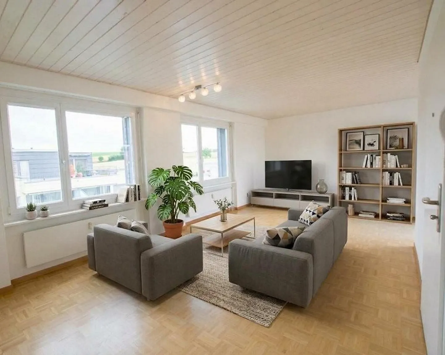 Penthouse apartment with large terrace near the agricultural zone in Brügg - Photo 4 of 12
