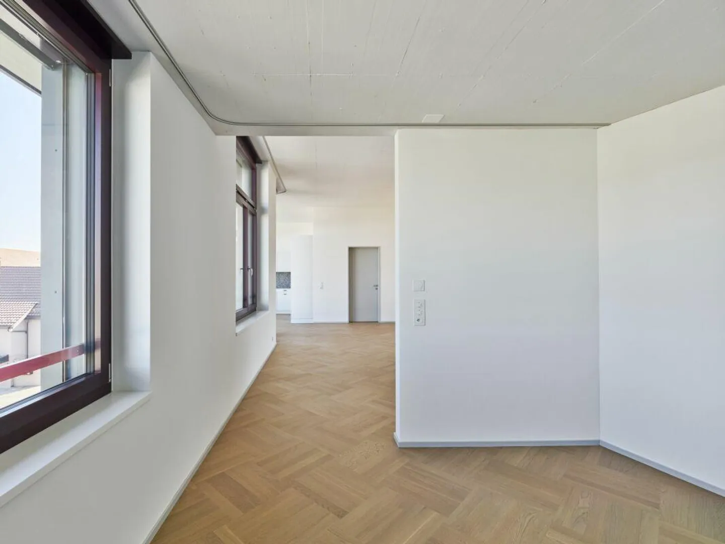 Room-high apartment in the new construction project "Chrüzacher" - Photo 5 of 12