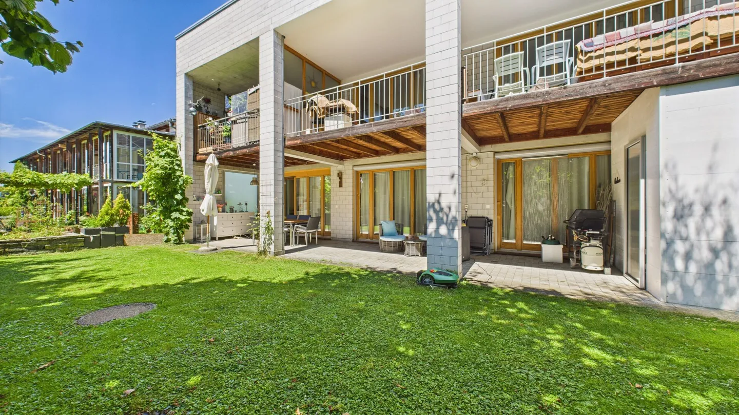 Familial, lumineux et moderne - appartement de jardin élégant. - Photo 2 sur 23