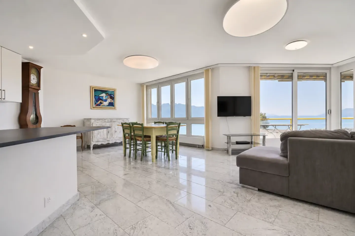Attico eccezionale con vista panoramica sul lago e sulle montagne - Foto 1 di 13