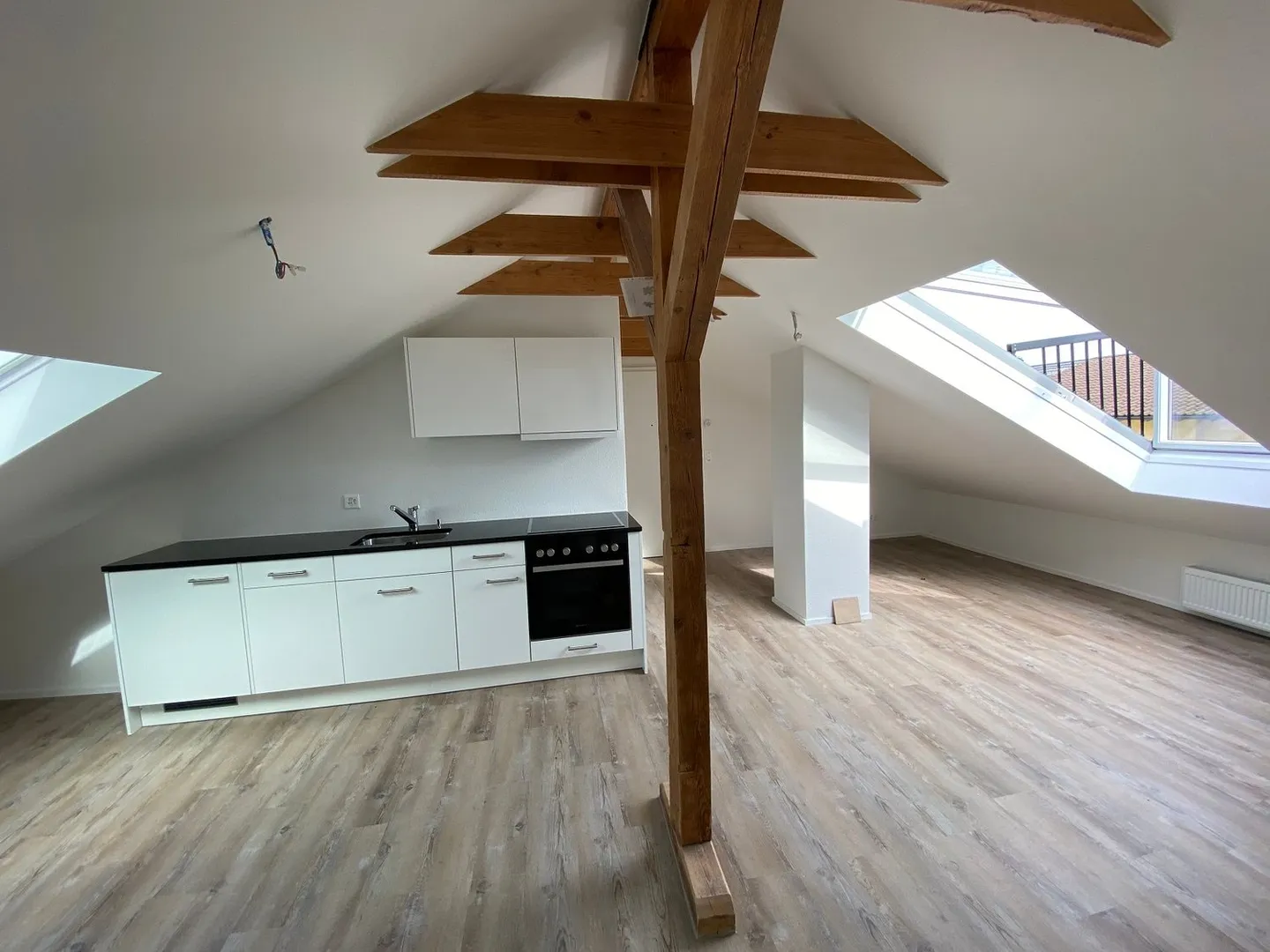 Newly created penthouse apartment with roof balcony window - Photo 2 of 7