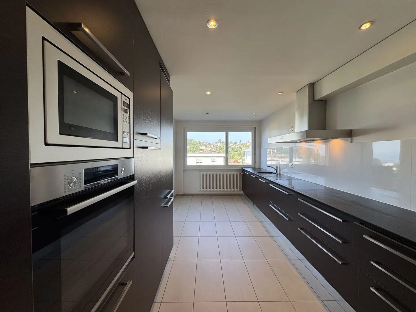 Elegant 4.5 rooms with terrace and exceptional lake view - Photo 6 of 17