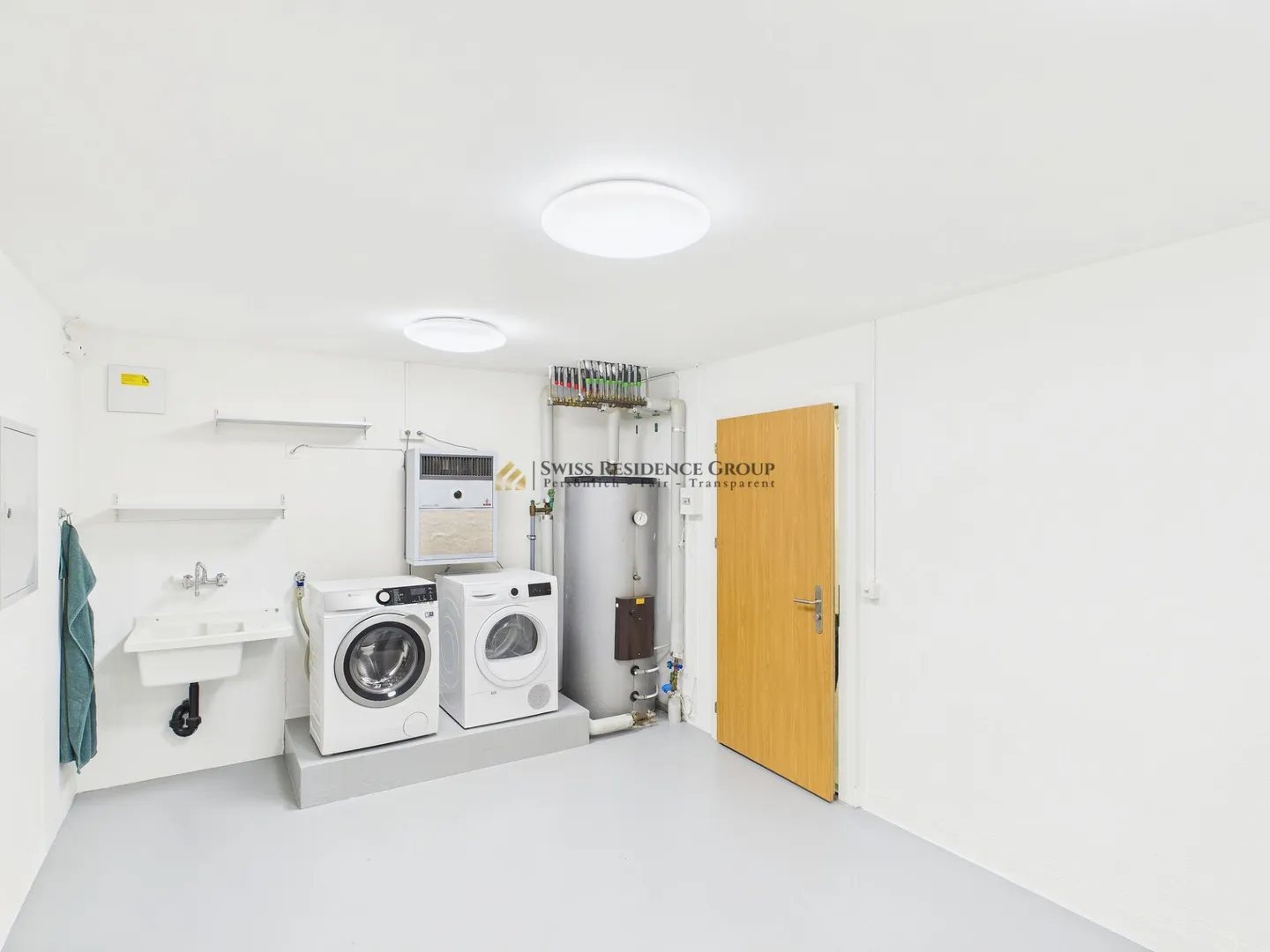 Wohnen mit Weitblick: Traumhafte 6.5-Zimmer-Terrassenwohnung mit Seesicht in Wollerau - Foto 25 von 28