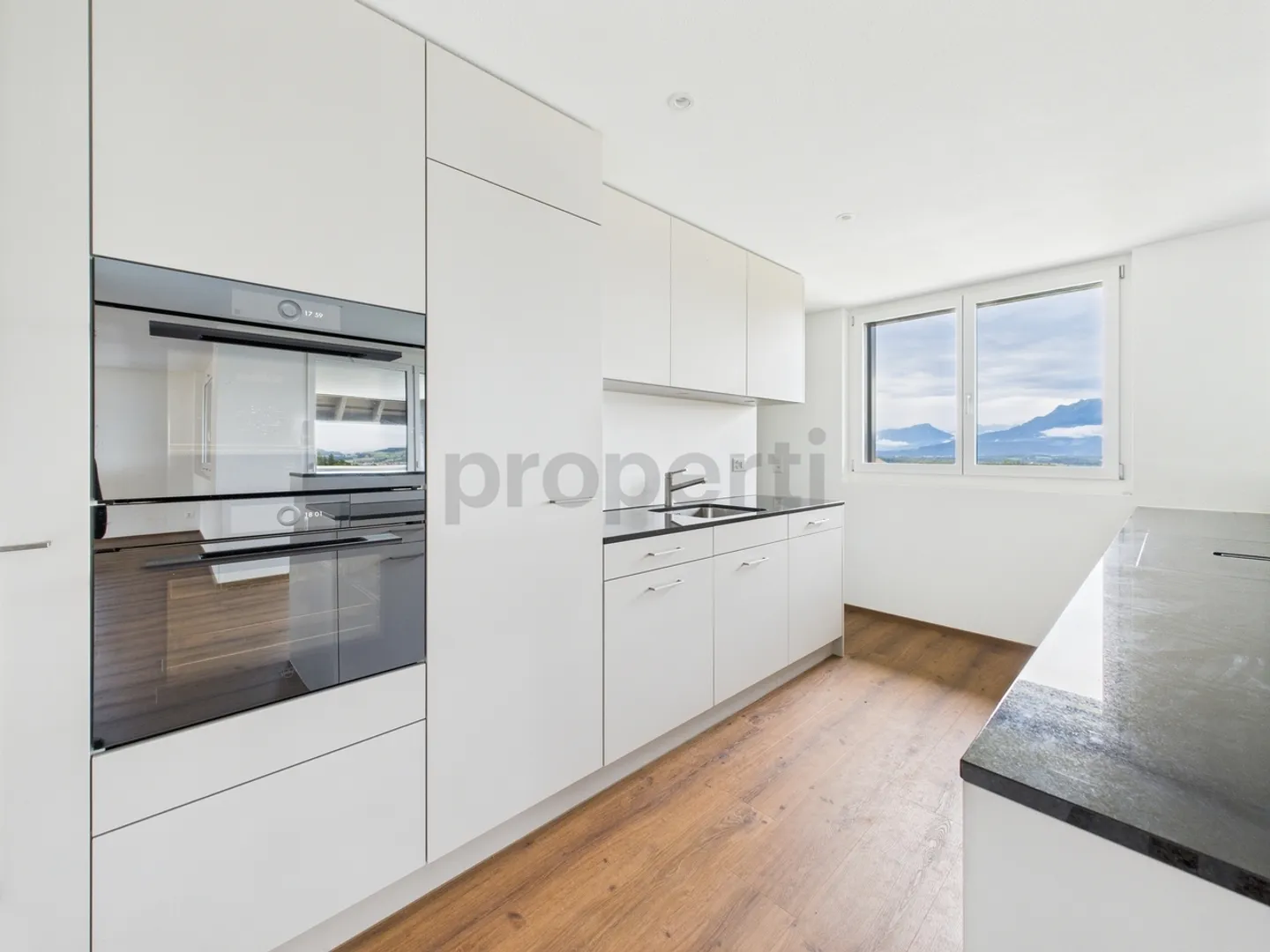 Charmante 6.5-Zimmer Wohnung in Sempach mit Seeblick und Bergsicht - Foto 4 von 12