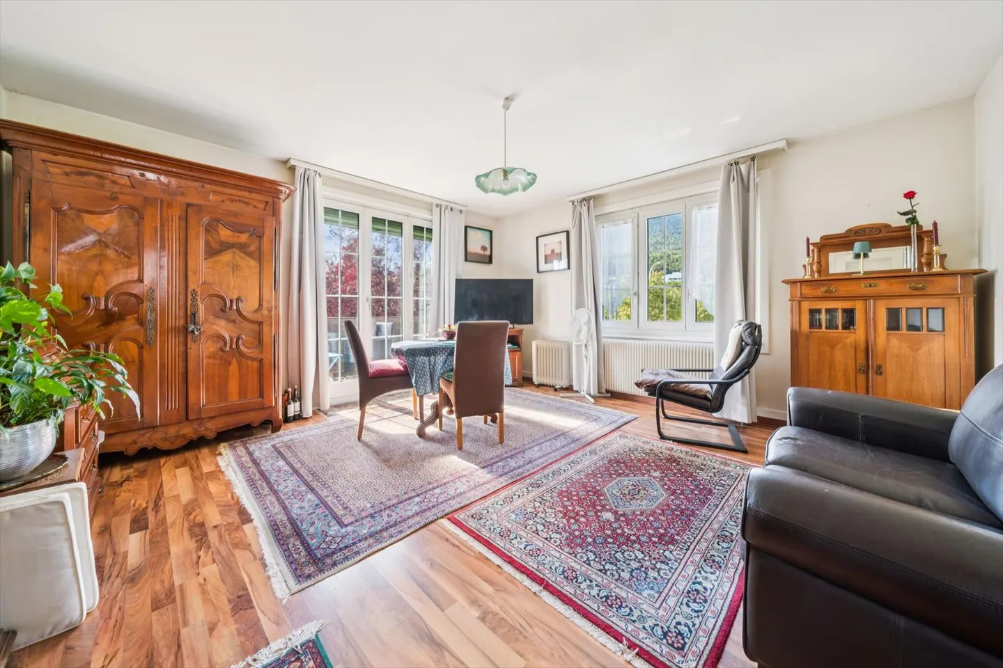 Haus mit drei Wohnungen und Bauland - Foto 9 von 13