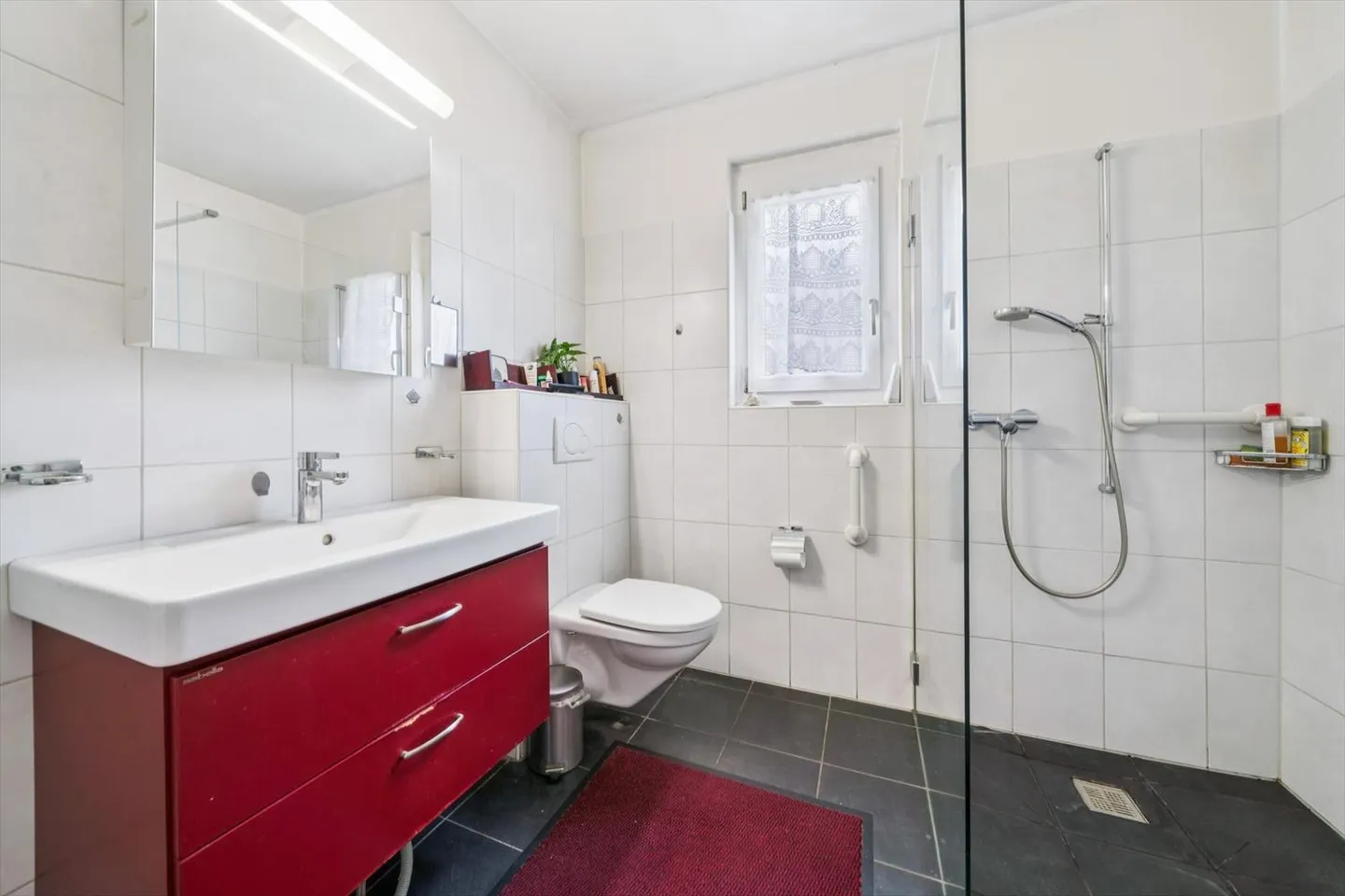 Haus mit drei Wohnungen und Bauland - Foto 11 von 13