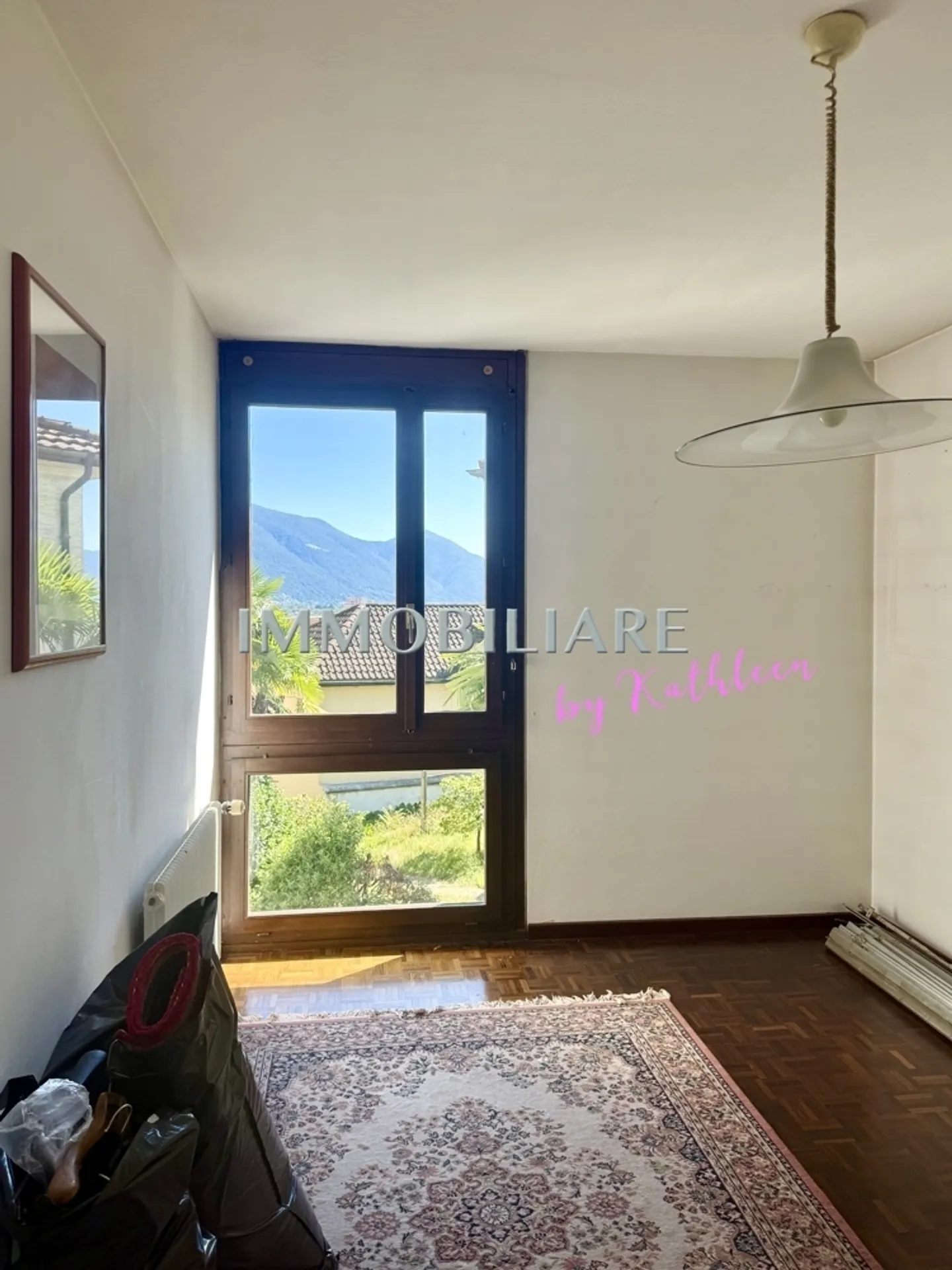 Appartamento per le vacanze con vista lago dal balcone, camino e sentiero per la stazione - Foto 8 di 13