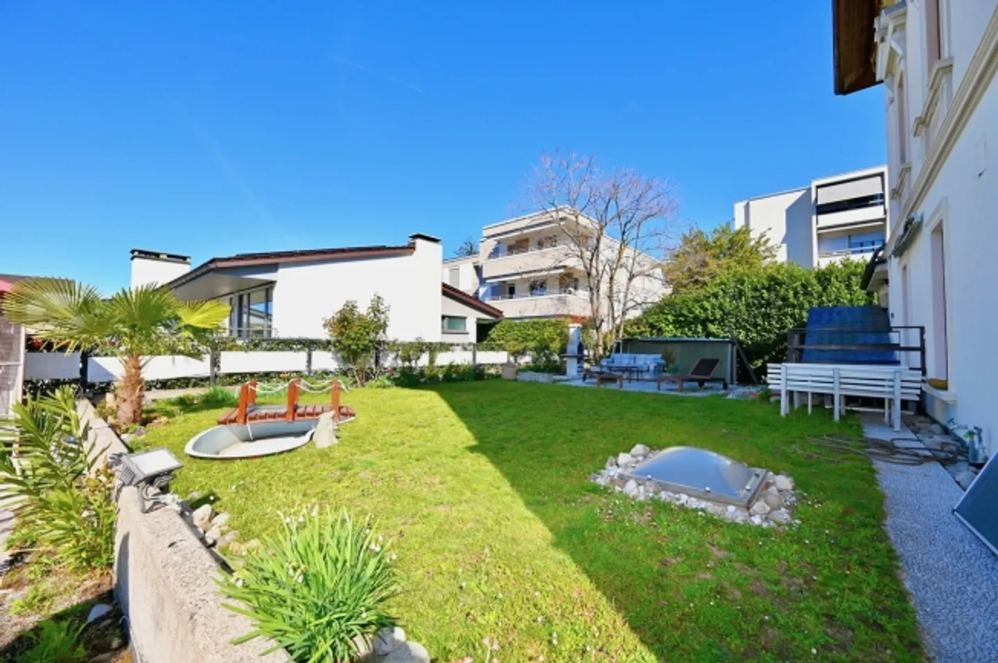 Bâtiment avec 2 appartements, jardin, garage et stockage - Photo 14 sur 15