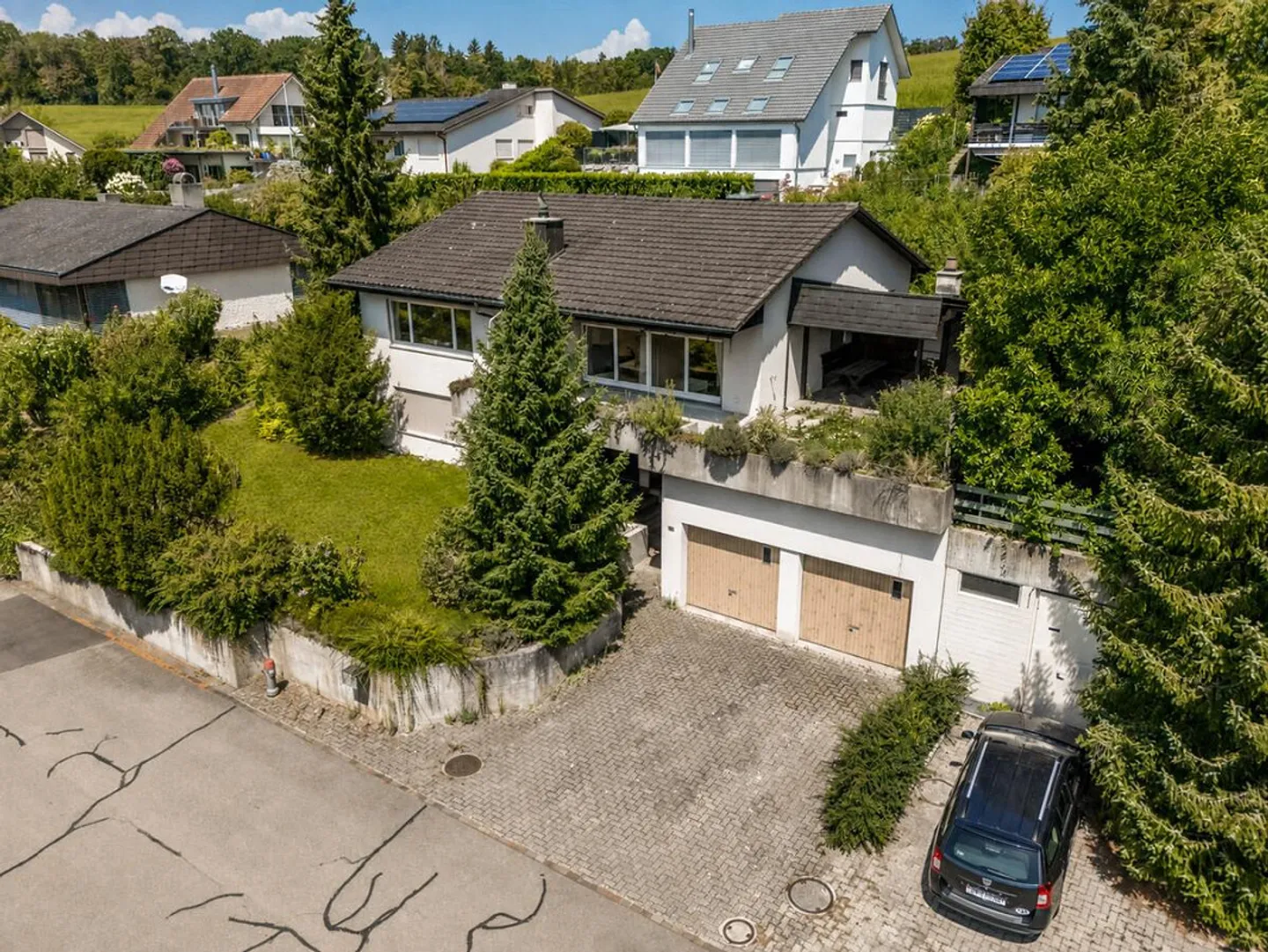 Einfamilienhaus in Winkel: ruhige Lage mit Weitsicht und grossem Ga... - Foto 2 von 5