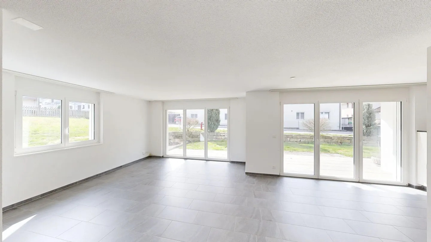 Appartamento attraente di 3,5 stanze con area giardino - Foto 2 di 13