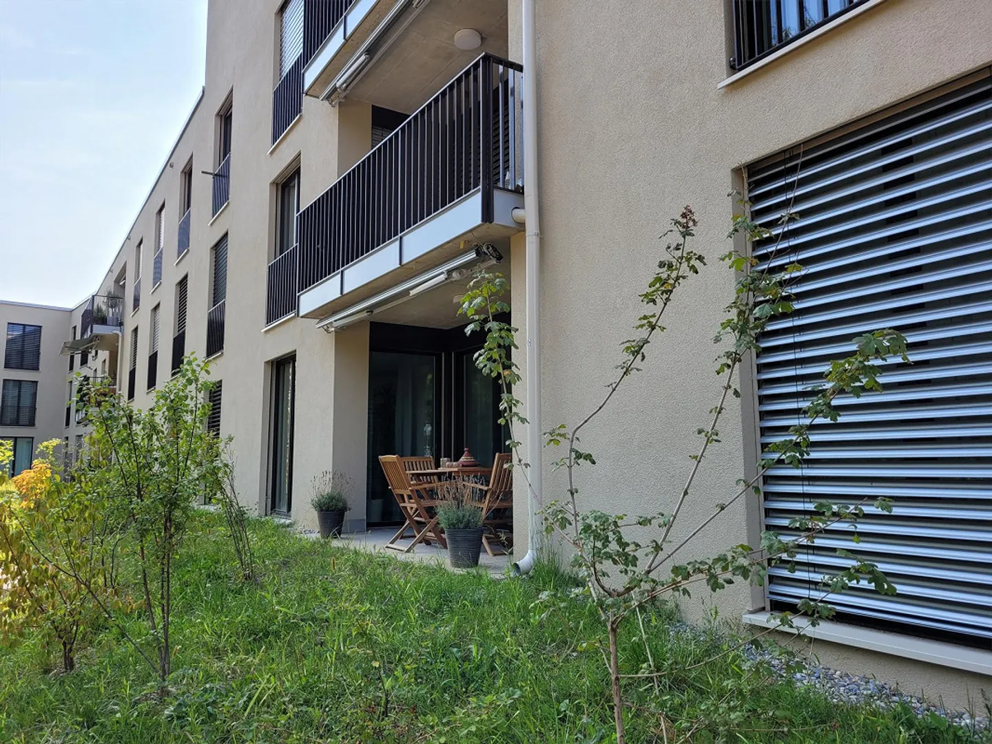 Appartement de jardin 2,5 pièces (rez-de-chaussée) avec terrasse + tour de lavage privé - Photo 1 sur 11