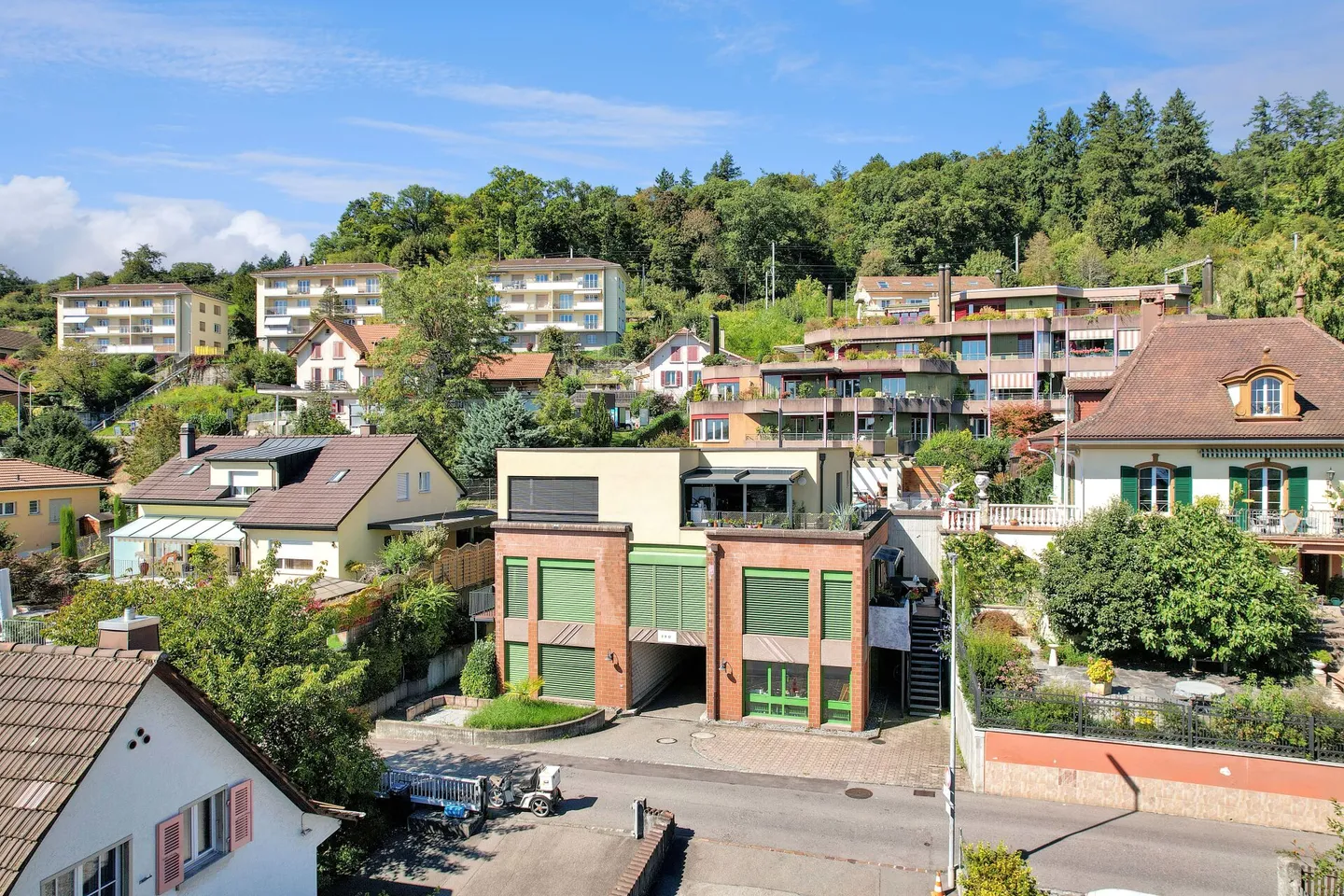 Renovated multi-family house with 5 residential units and parking garage - Photo 1 of 13