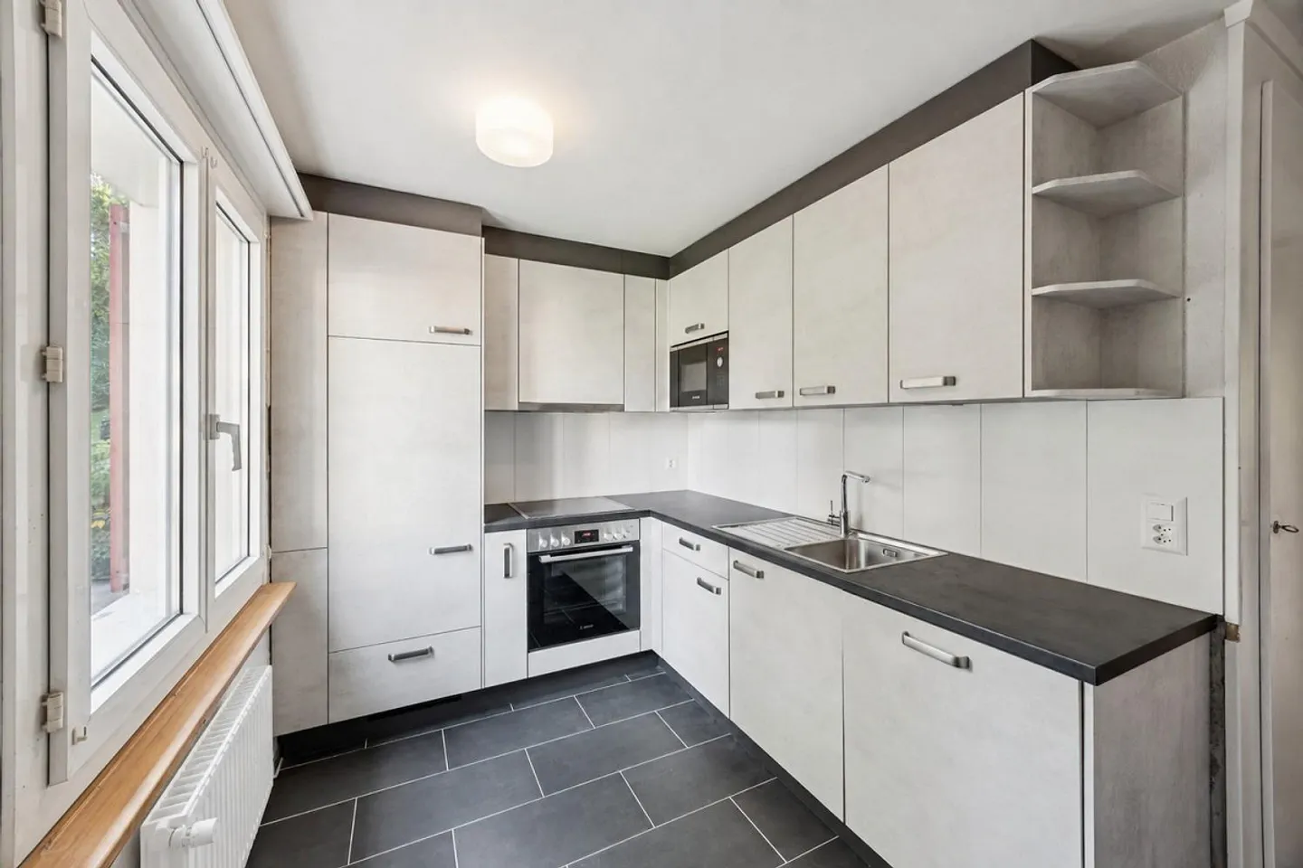 Appartement moderne fraîchement rénové à louer - Photo 7 sur 8