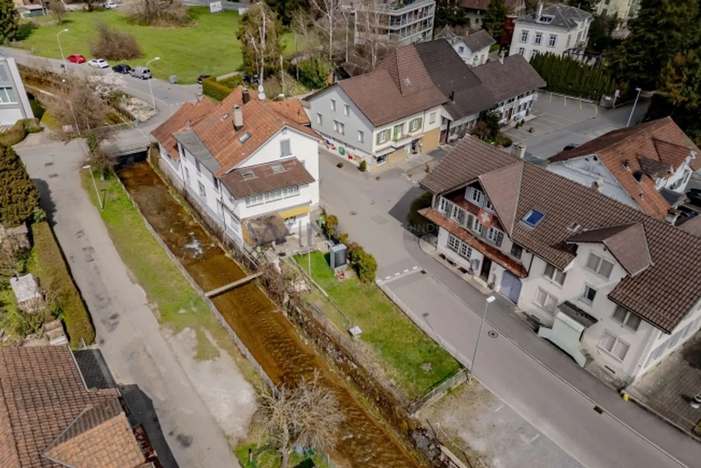 Attractive multi-family house with development potential in a central location of Reinach - Photo 2 of 7