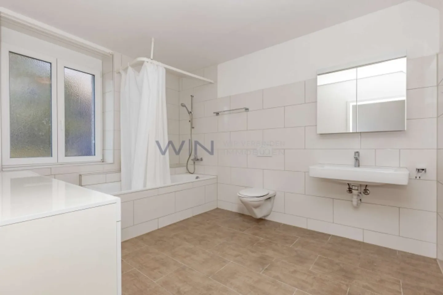 Attractive multi-family house with development potential in a central location of Reinach - Photo 7 of 7