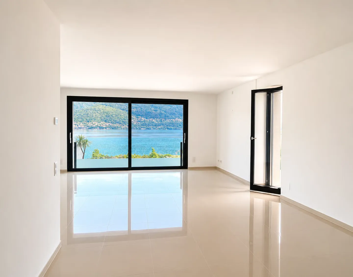 BRISSAGO - VENDU APPARTEMENT LUMINEUX 3.5 CHAMBRES AVEC VUE IMPRENABLE SUR LE LAC - Photo 1 sur 11