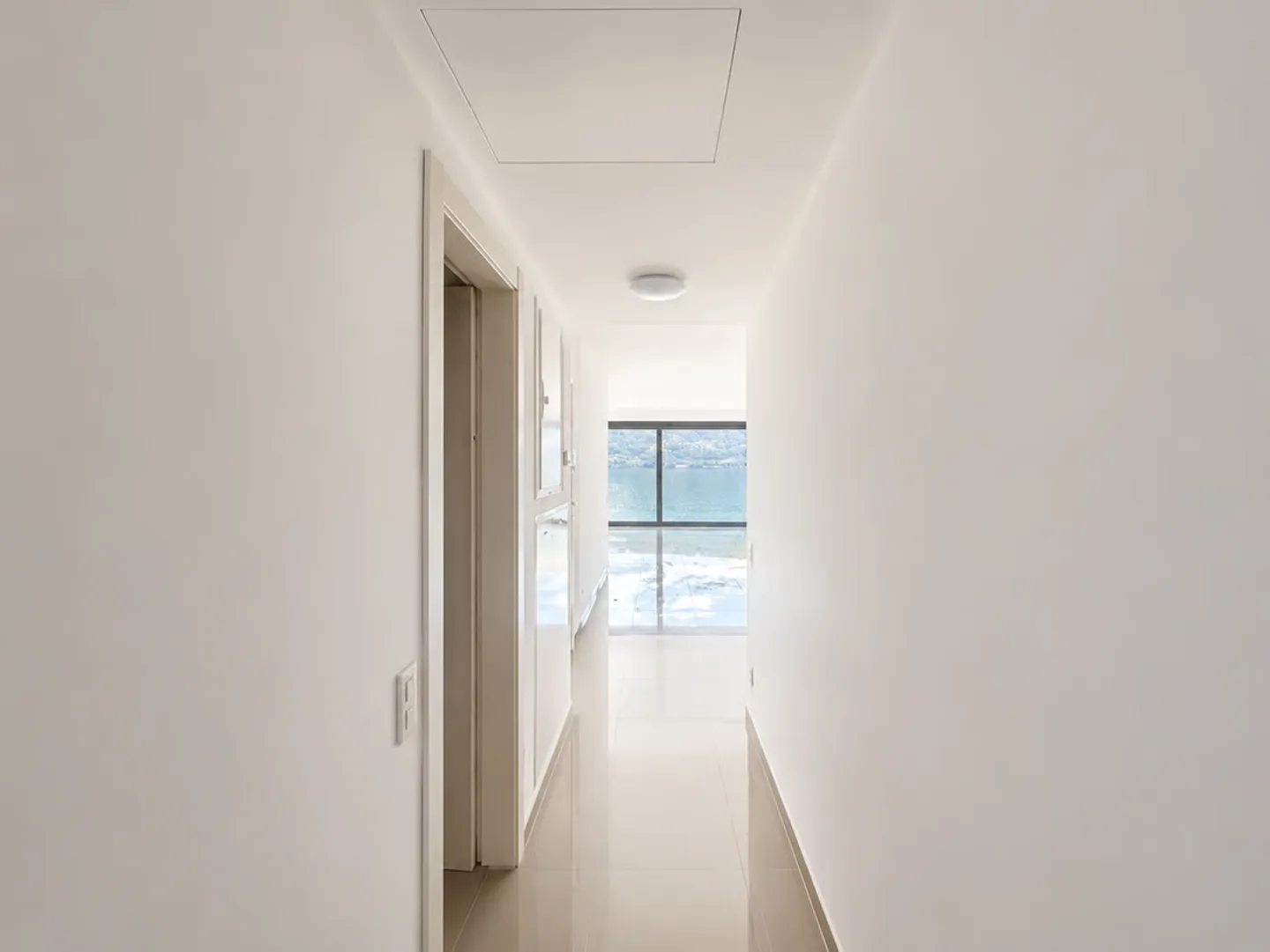 BRISSAGO - VENDU APPARTEMENT LUMINEUX 3.5 CHAMBRES AVEC VUE IMPRENABLE SUR LE LAC - Photo 5 sur 11