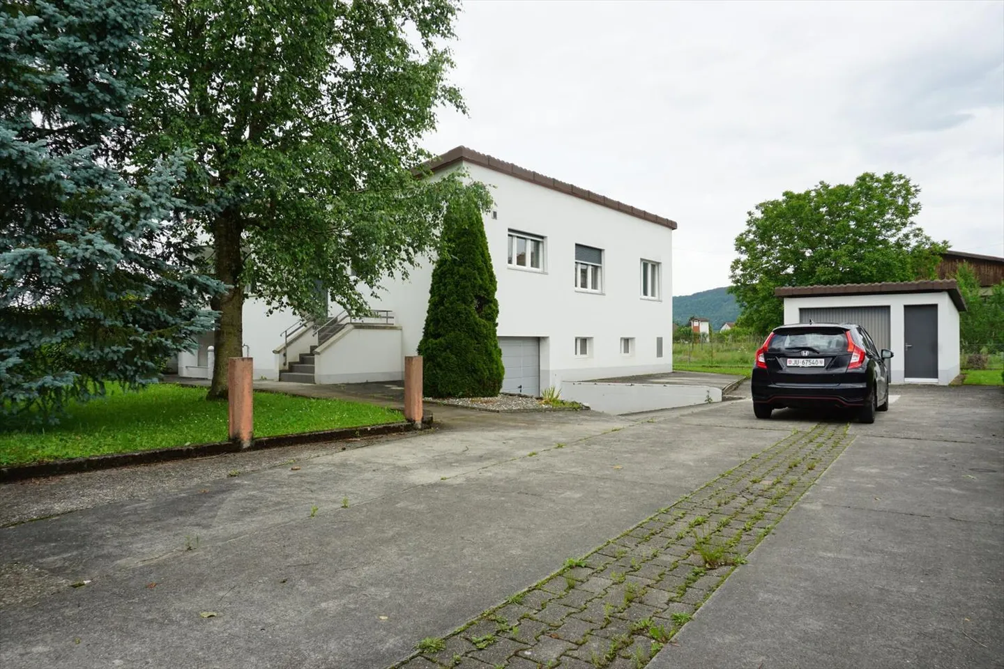 ARI-236 - Rendimento - Bellissima casa con 2 appartamenti di 4,5 e 3,5 stanze su un terreno di 1'134 m2. - Foto 3 di 13