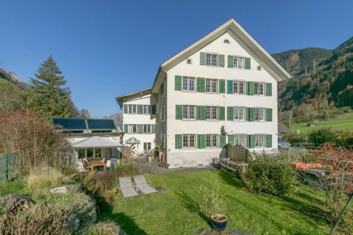 Casa bifamiliare di 8,5 stanze con studio e giardino - Foto 1 di 14