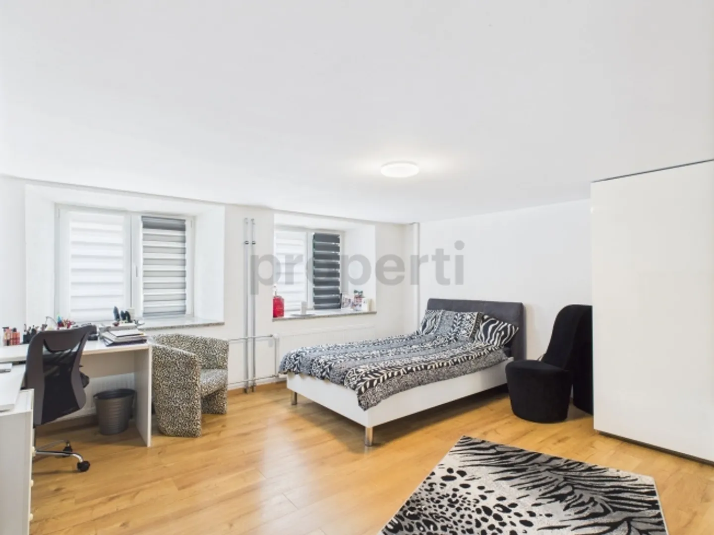 Grosszügiges Eck-Reihenhaus mit Studio, sonnigem Balkon und Bergsicht - Foto 7 von 12