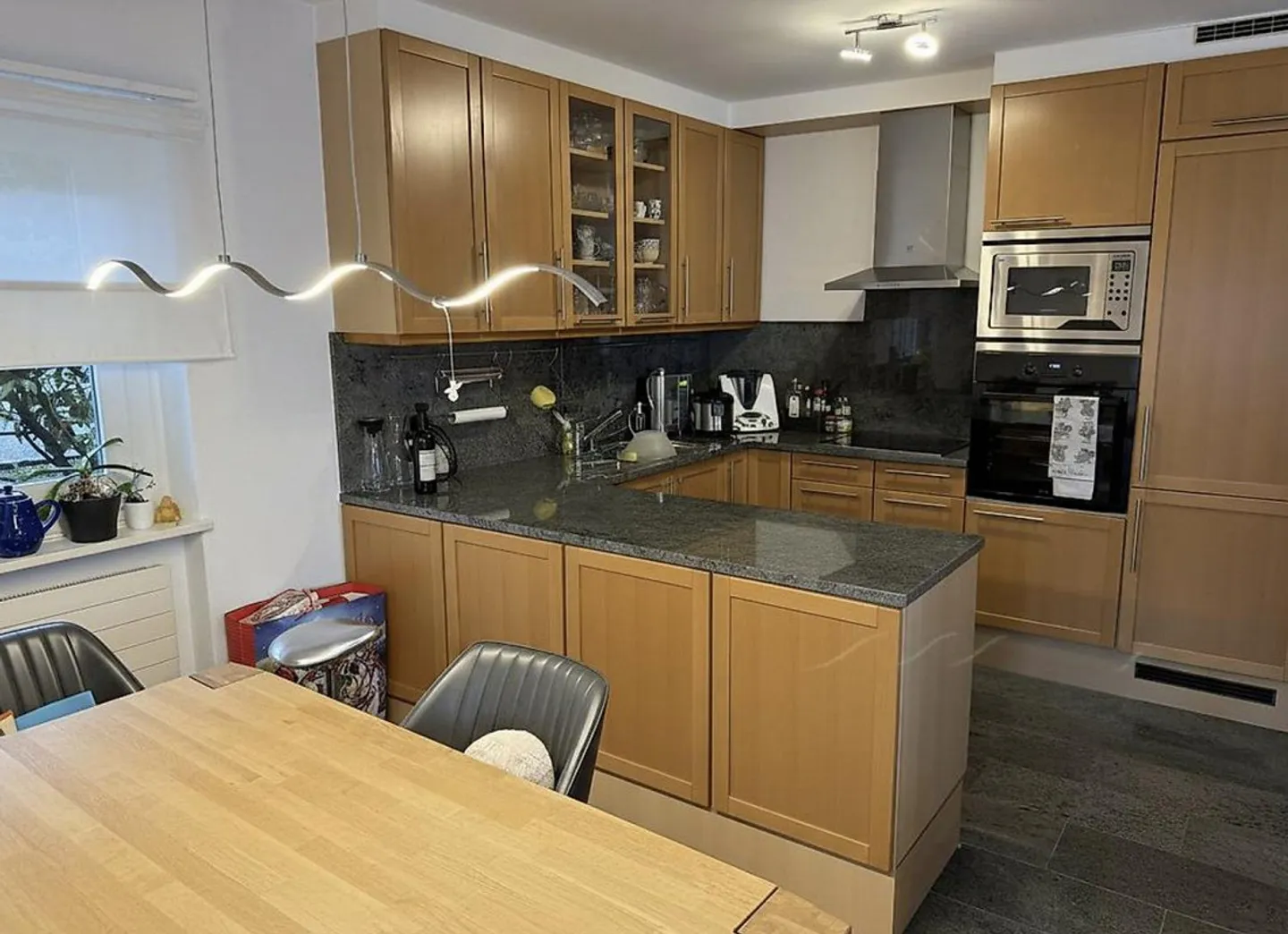 Bright apartment with lake view in Porza - Photo 2 of 11