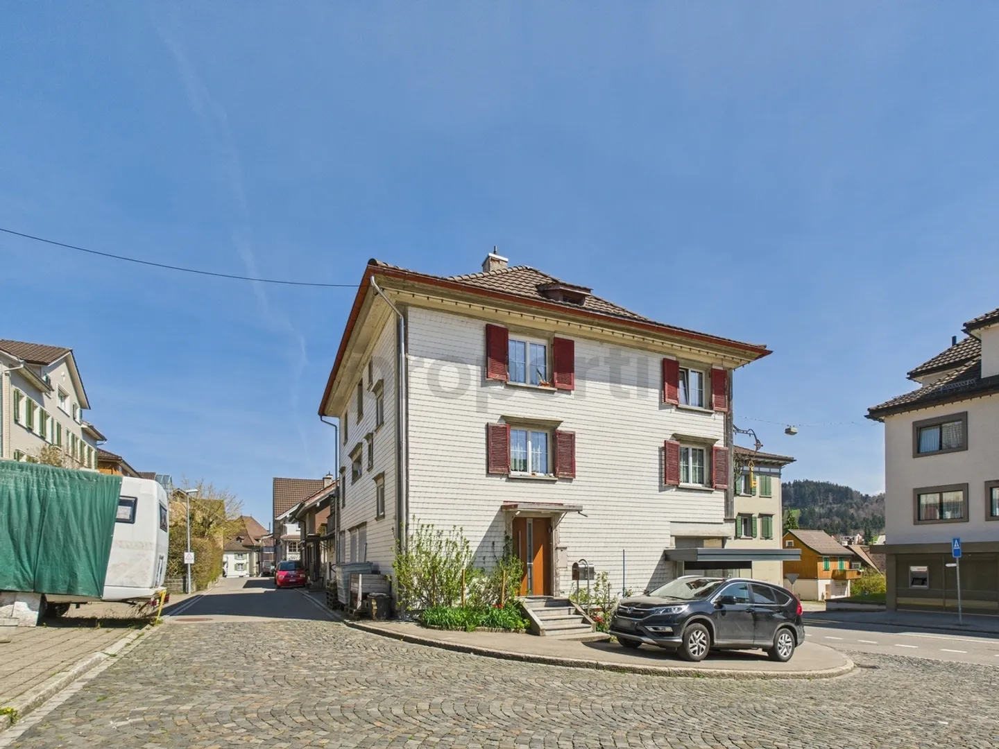 Zuhause mit Zusatznutzen - grosszügige 5.5-Zimmer-Wohnung &amp; Mieteinnahmen im Erdgeschoss - Foto 1 von 13