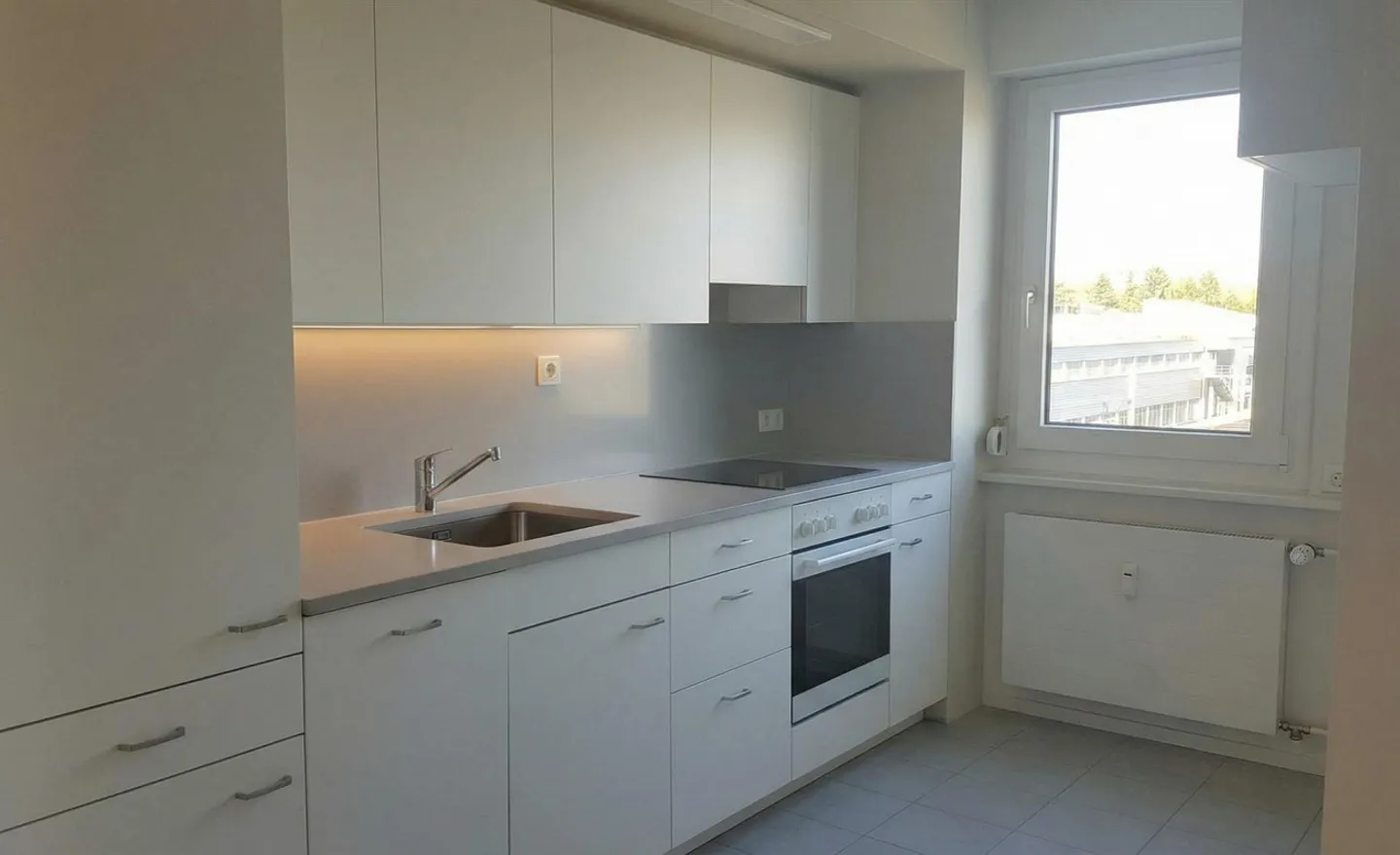 Appartamento 4 locali con balcone e 2 posti auto in garage sotterraneo in posizione tranquilla - Foto 2 di 7