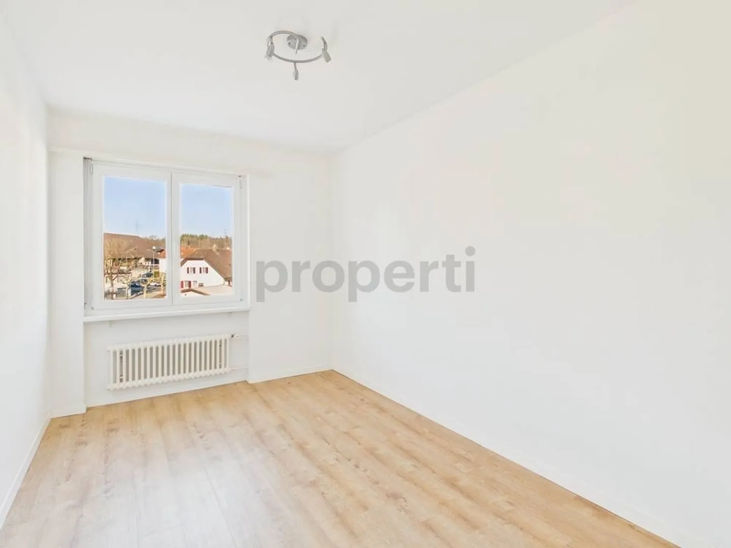 Geräumige Wohnung mit Balkon - Foto 6 von 8