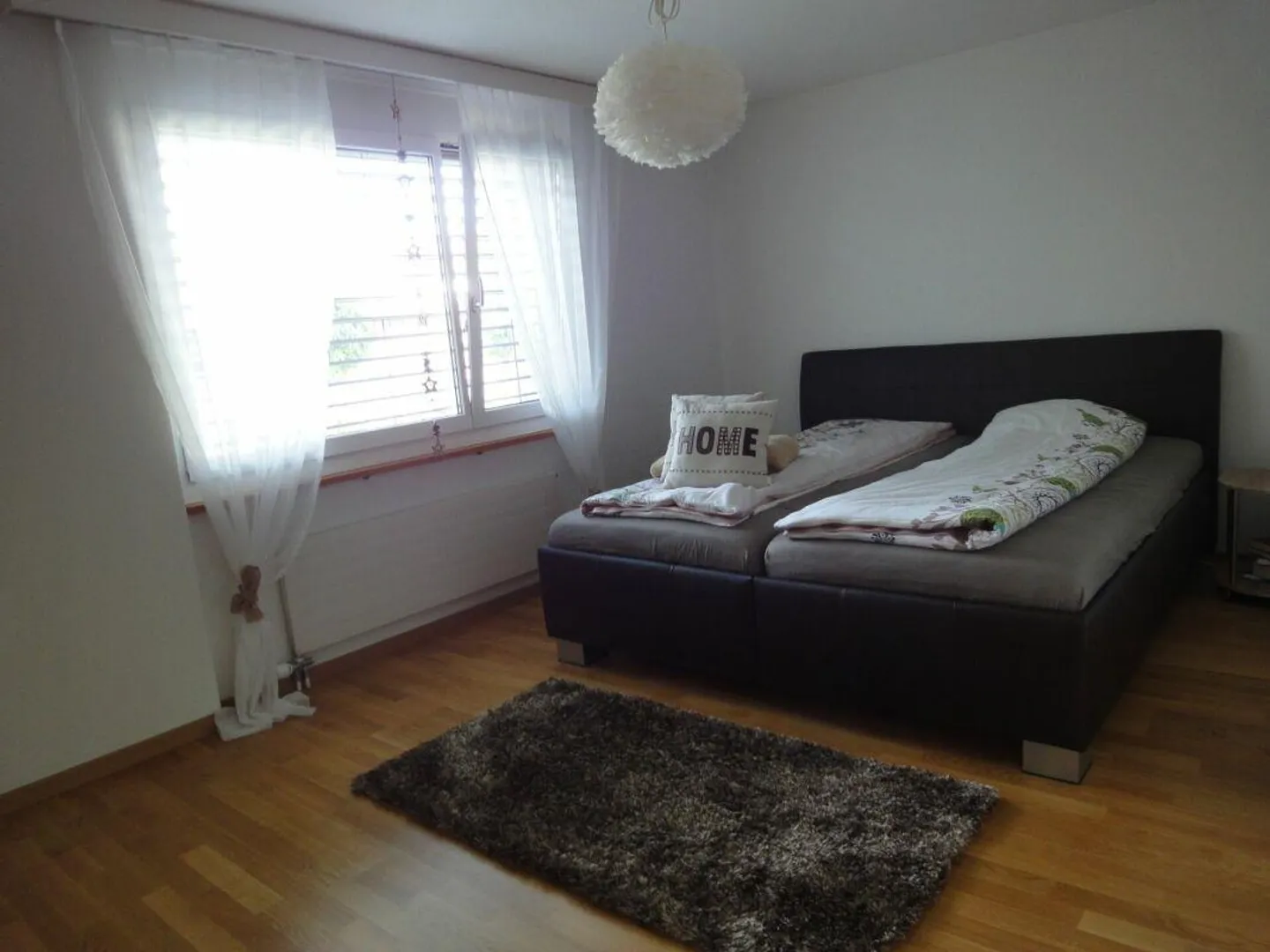 Appartamento 2,5 locali con area giardino - Foto 6 di 7