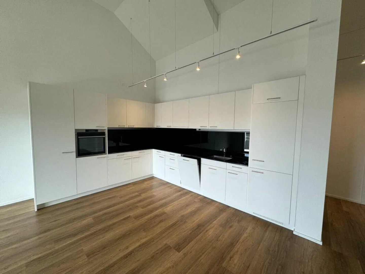 Moderne Attikawohnung mit Balkonen - Foto 4 von 14