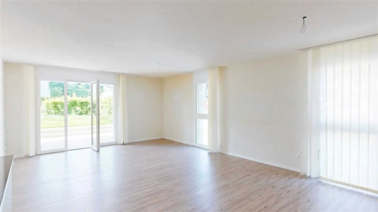 Appartement moderne de 3,5 pièces avec jardin - Photo 3 sur 11