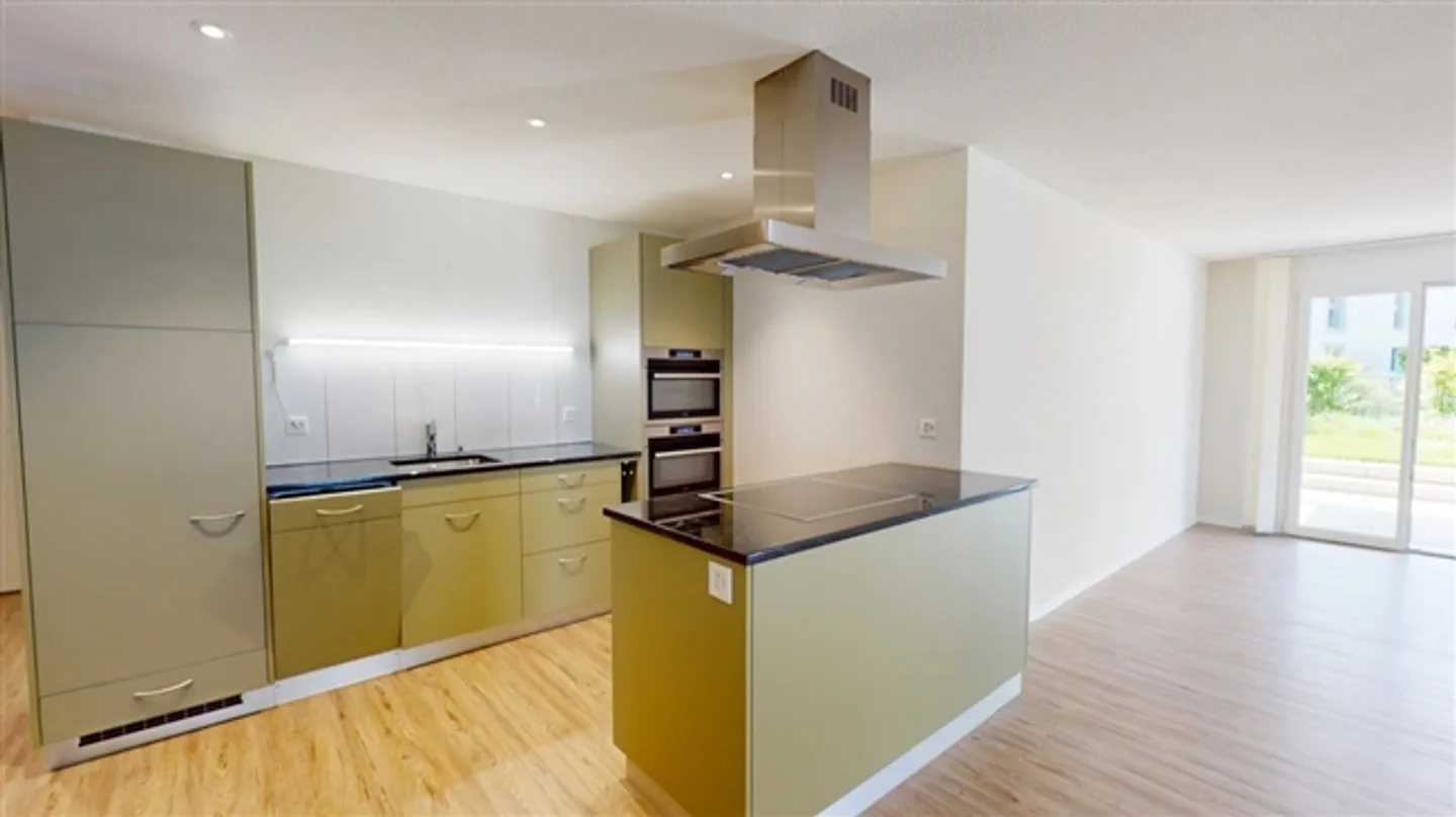 Appartement moderne de 3,5 pièces avec jardin - Photo 5 sur 11