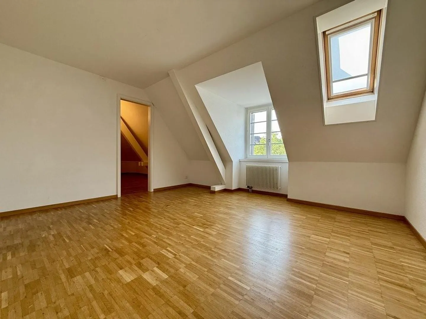 Wunderschöne Dachwohnung in der Stadt - Foto 3 von 6