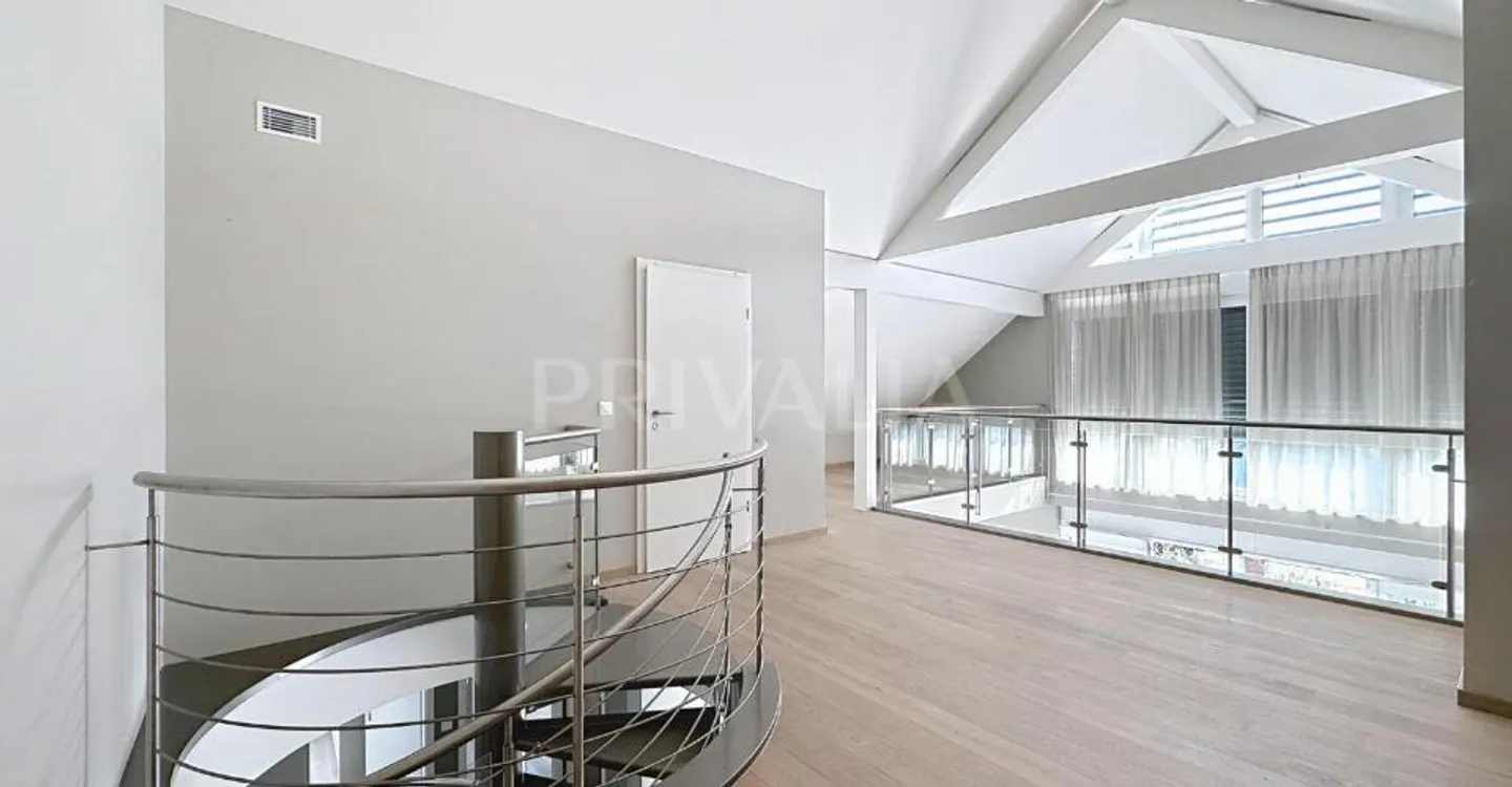 Duplex Minergie Attic of 135 m² with Balcony and Fireplace in Mies - Photo 5 of 6