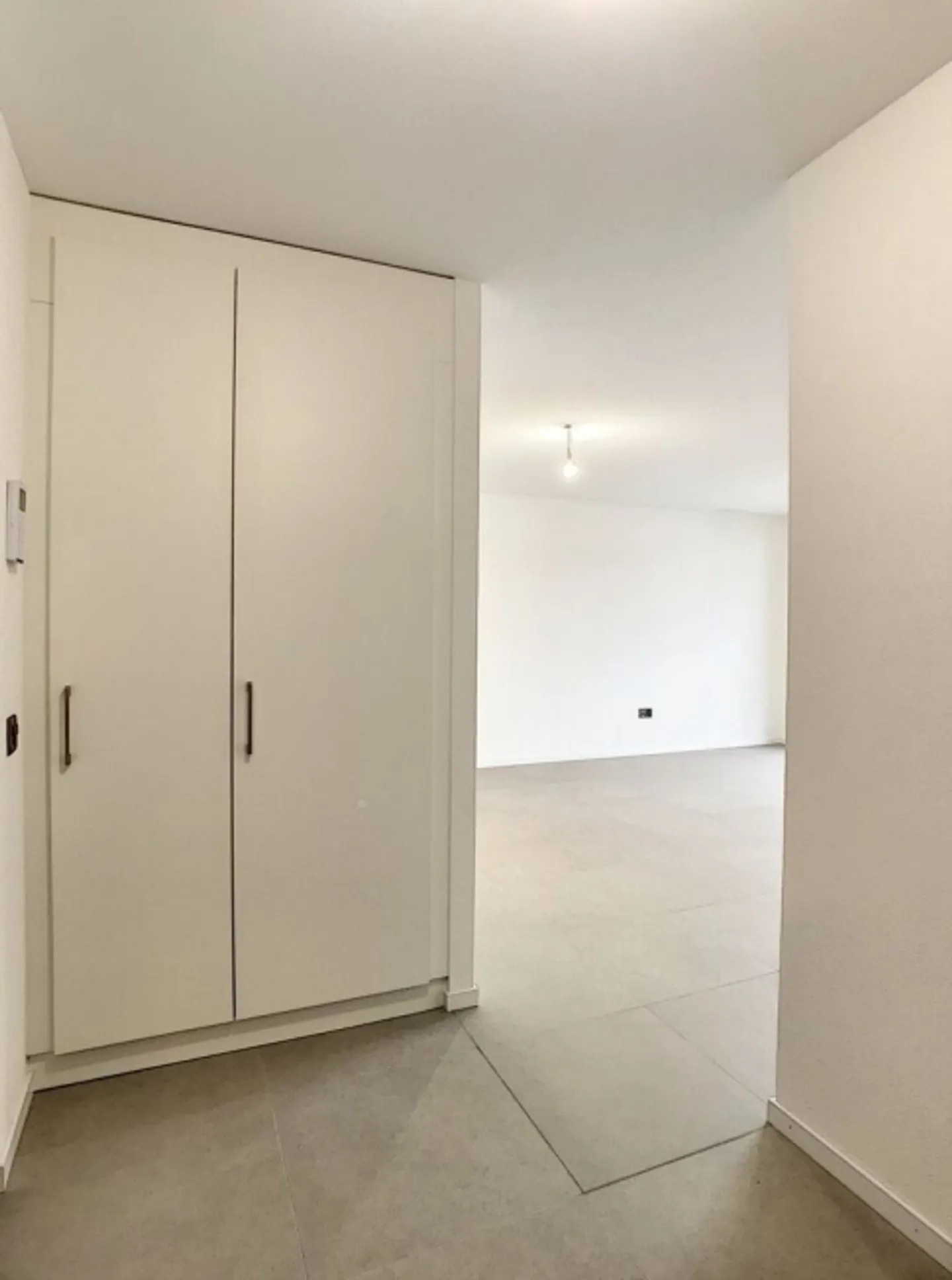 Appartement 2,5 pièces avec cadre et terrasse - Photo 4 sur 8