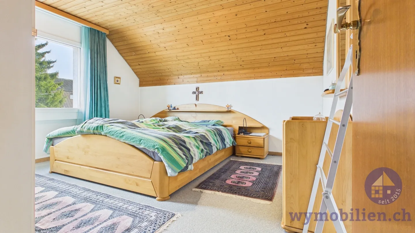 Casa bifamiliare con giardino + 2 garage a Lyssach - Foto 10 di 12