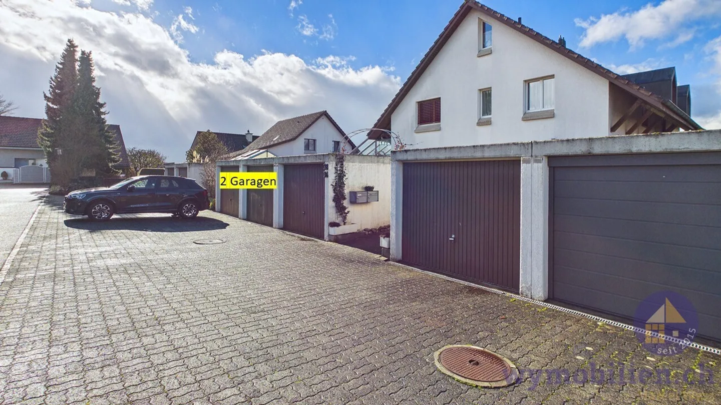 Casa bifamiliare con giardino + 2 garage a Lyssach - Foto 11 di 12