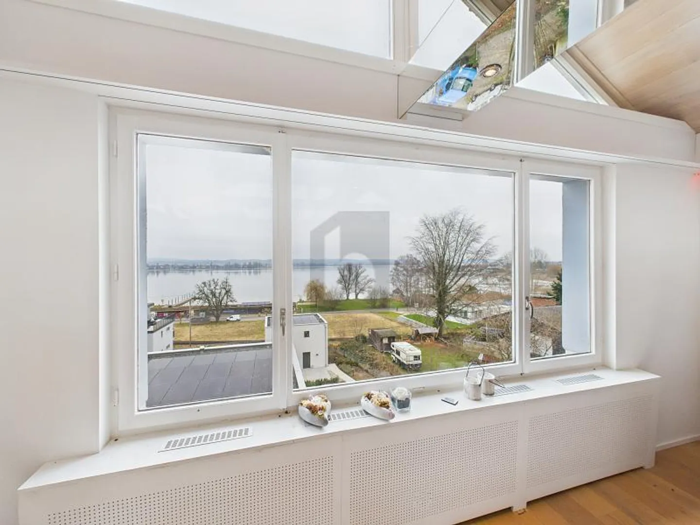 Charmantes Loft mit Seeblick - Foto 5 von 6