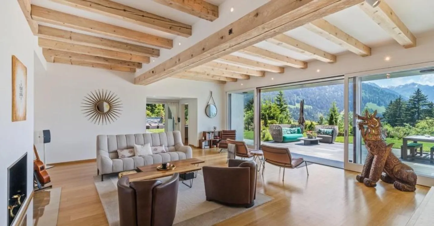 Spacious chalet with heated pool and stunning view of the Alps - Photo 1 of 12