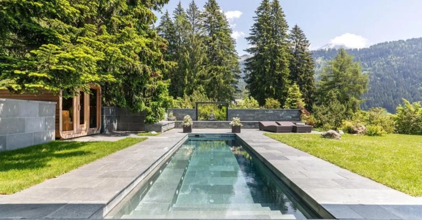 Spacious chalet with heated pool and stunning view of the Alps - Photo 2 of 12