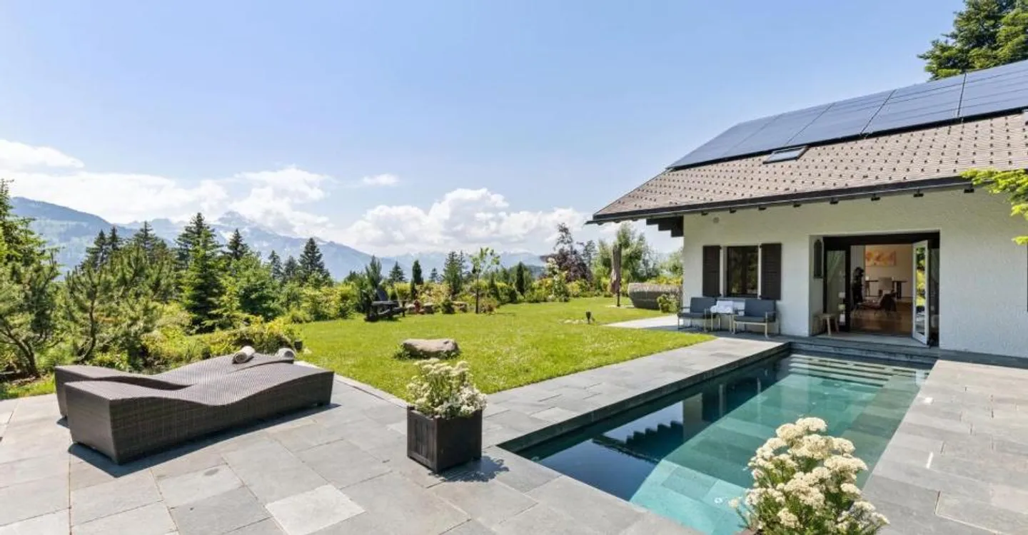 Spacious chalet with heated pool and stunning view of the Alps - Photo 4 of 12