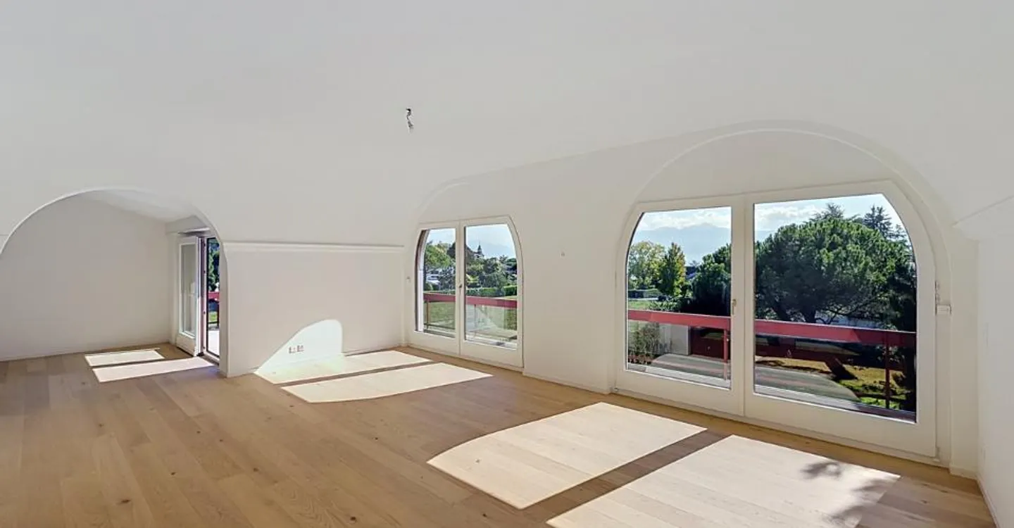 Exclusive Attic Apartment by Lake - Photo 2 of 12