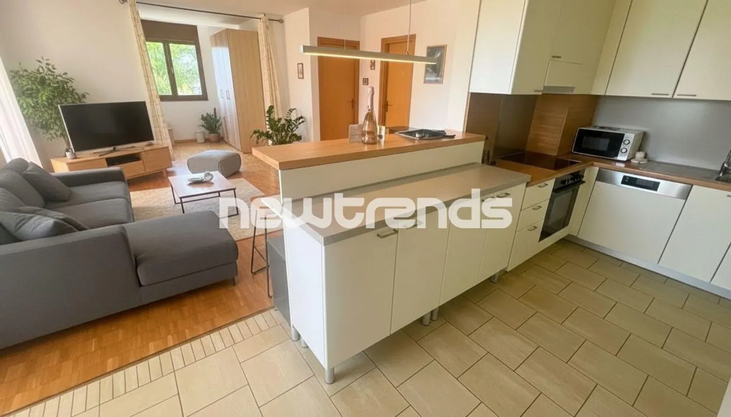 GRAND APPARTEMENT DE 2.5 PIÈCES AVEC PETITE TERRASSE ET VUE PARTIELLE SUR LE LAC AVEC PLACE DE PARKING - Photo 4 sur 13