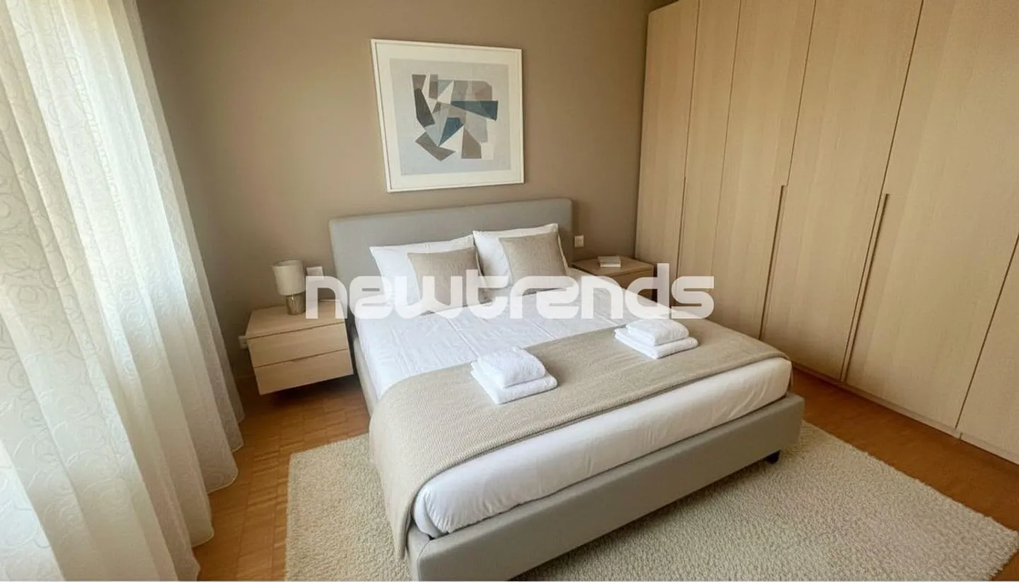 GRAND APPARTEMENT DE 2.5 PIÈCES AVEC PETITE TERRASSE ET VUE PARTIELLE SUR LE LAC AVEC PLACE DE PARKING - Photo 7 sur 13